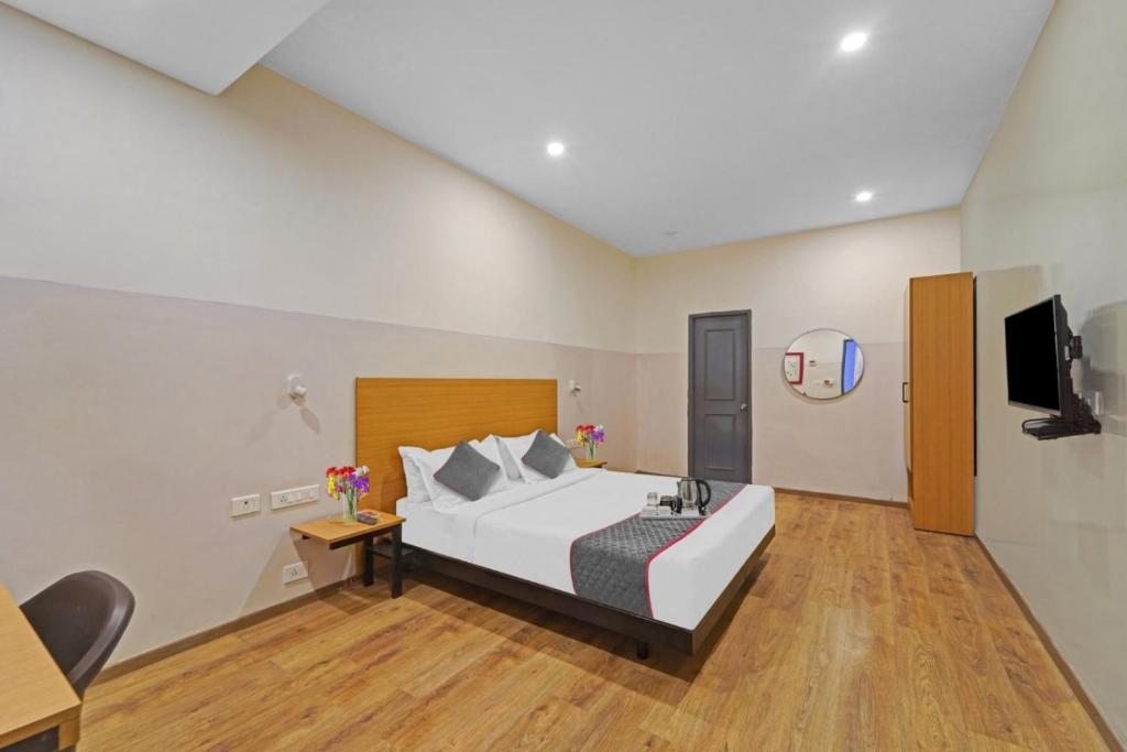 Postel nebo postele na pokoji v ubytování KS RESIDENCY