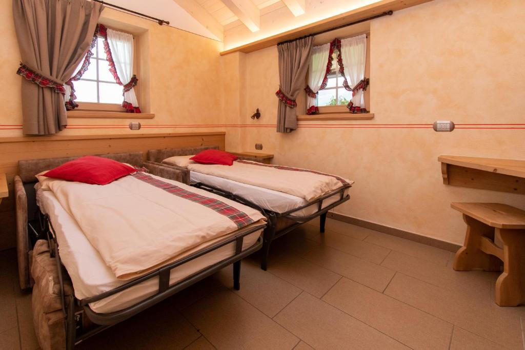 Postel nebo postele na pokoji v ubytování Al Solìf