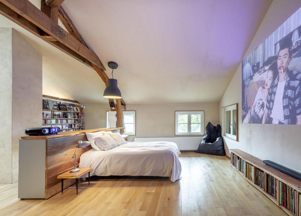 Cama o camas de una habitación en Ancienne fabrique de soie À la Galicière