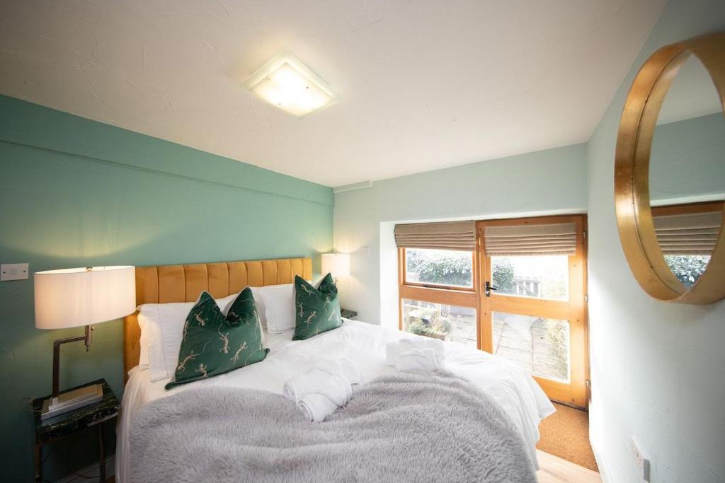 Llit o llits en una habitació de Nadin Cottage