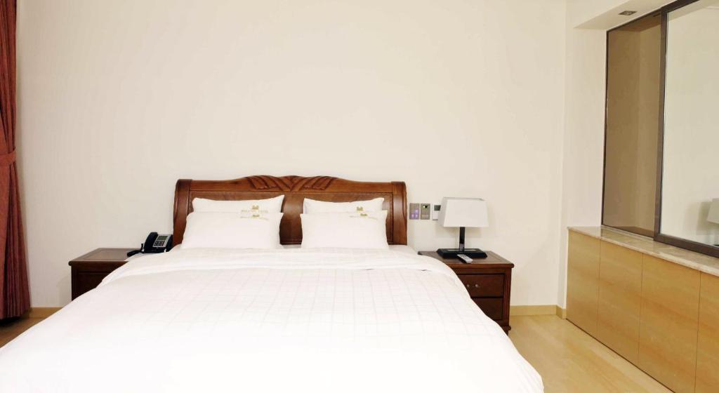 Postel nebo postele na pokoji v ubytování Fontana Beach Hotel