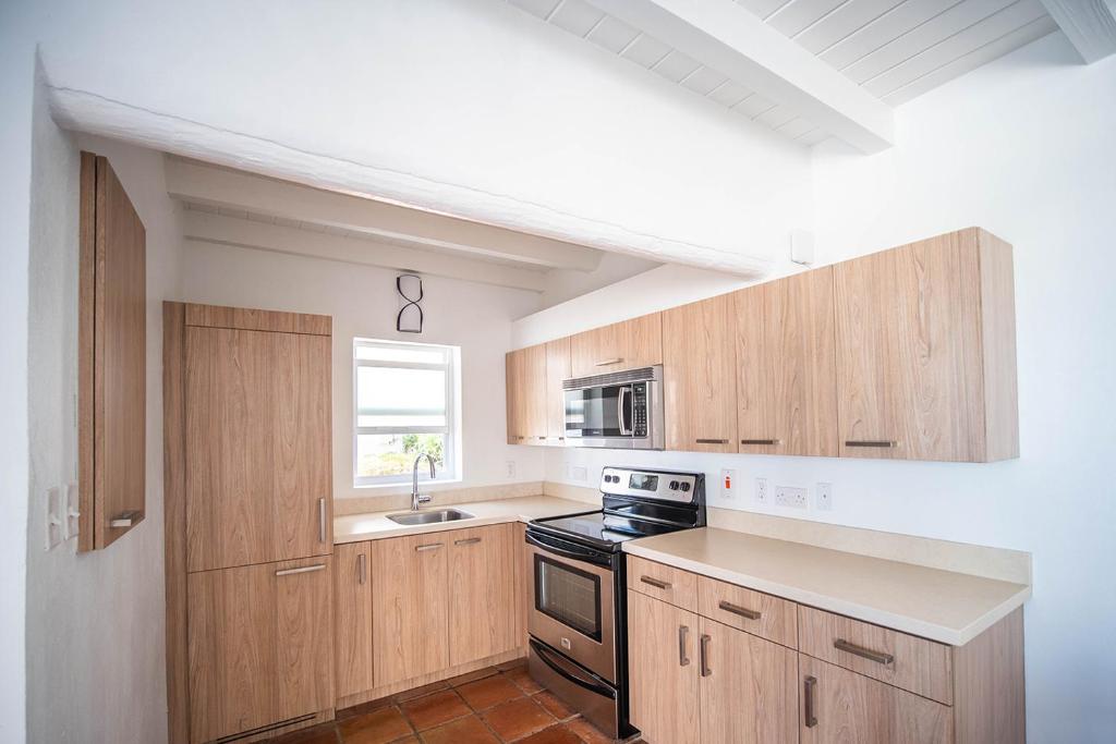 Cucina o angolo cottura di Windjammer Landing Resort and Residences
