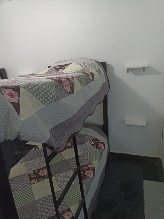 Una cama o camas en una habitación de Hostel INK - Duerme Como En Casa
