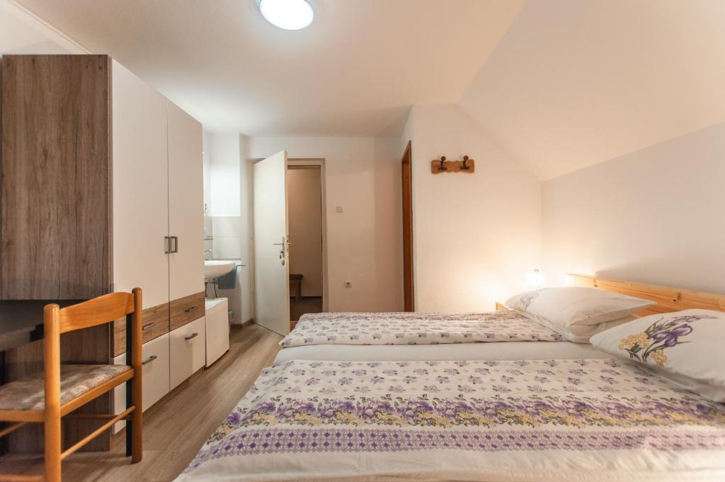 Postel nebo postele na pokoji v ubytování Apartment Ticar
