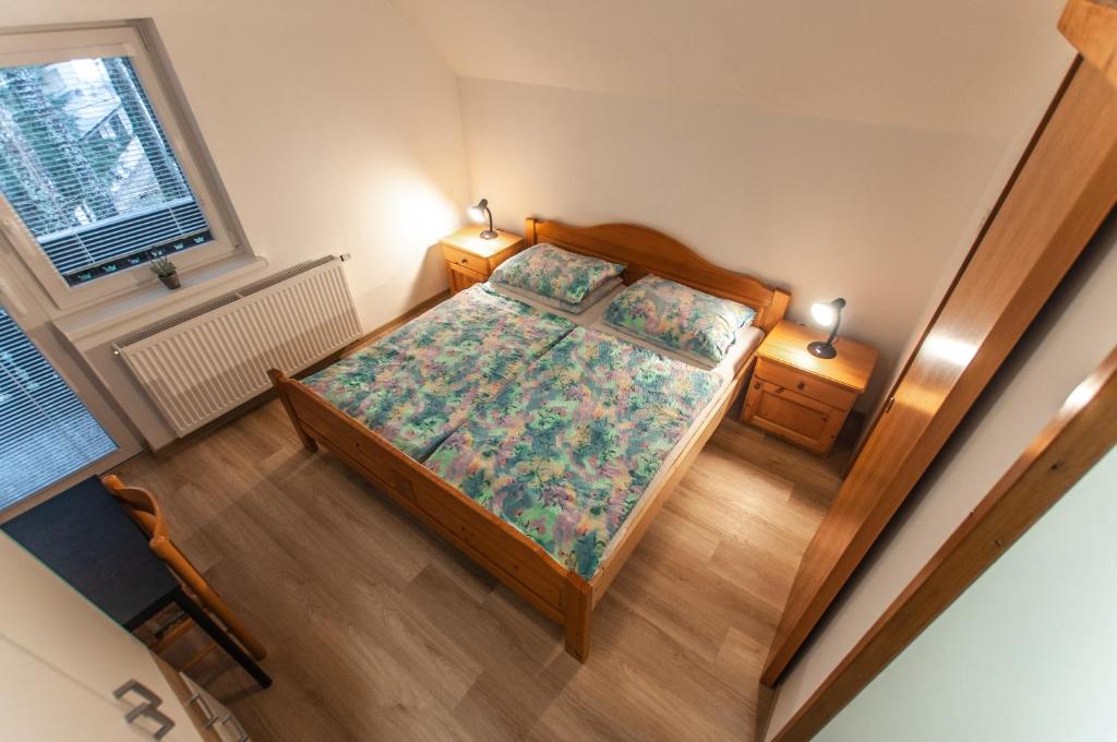 Postel nebo postele na pokoji v ubytování Apartment Ticar