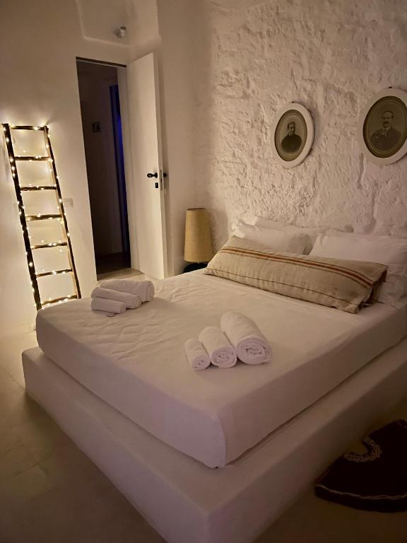 A bed or beds in a room at Corte Manfredi