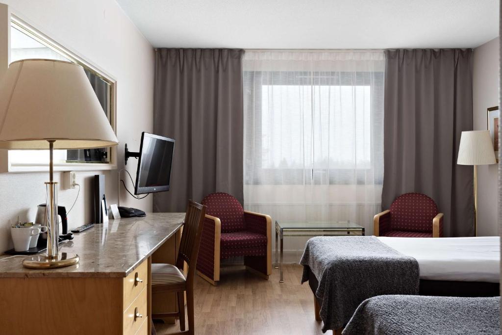 Postel nebo postele na pokoji v ubytování Best Western Gustaf Froding Hotel & Konferens