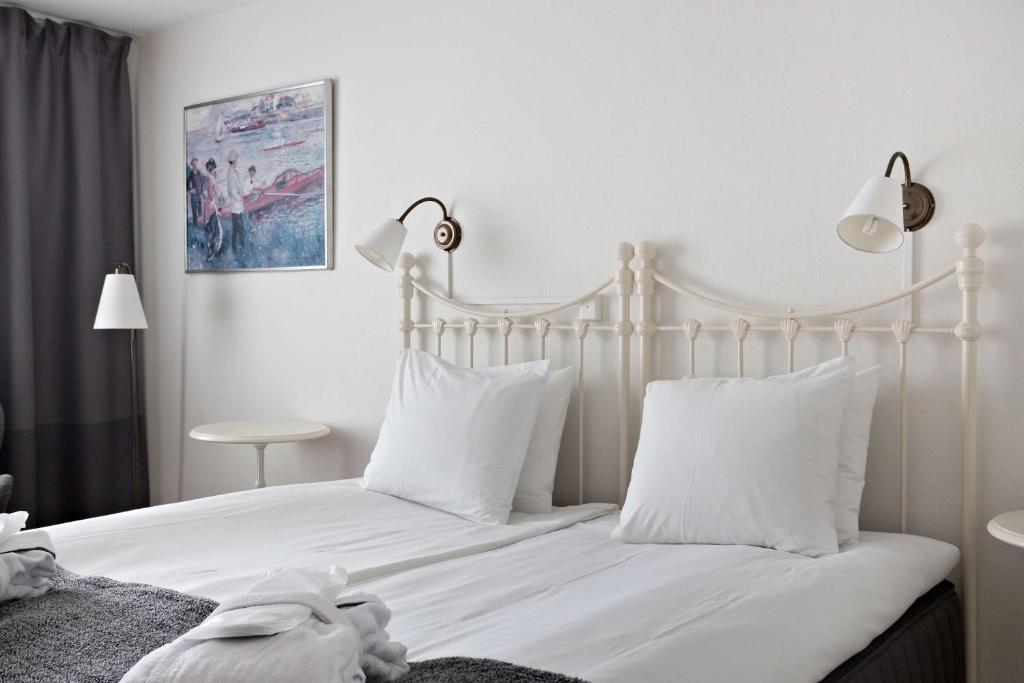 Postel nebo postele na pokoji v ubytování Best Western Gustaf Froding Hotel & Konferens