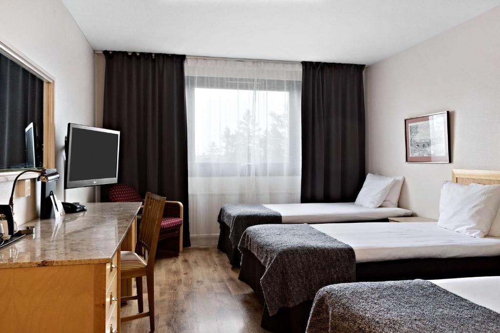 TV a/nebo společenská místnost v ubytování Best Western Gustaf Froding Hotel & Konferens