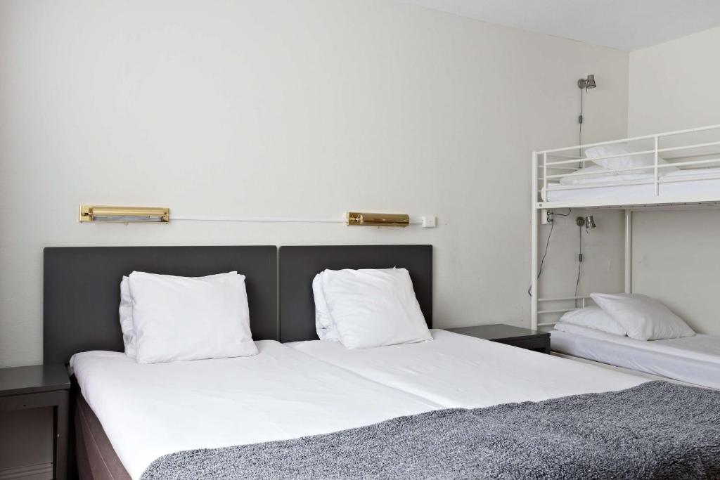 Postel nebo postele na pokoji v ubytování Best Western Gustaf Froding Hotel & Konferens