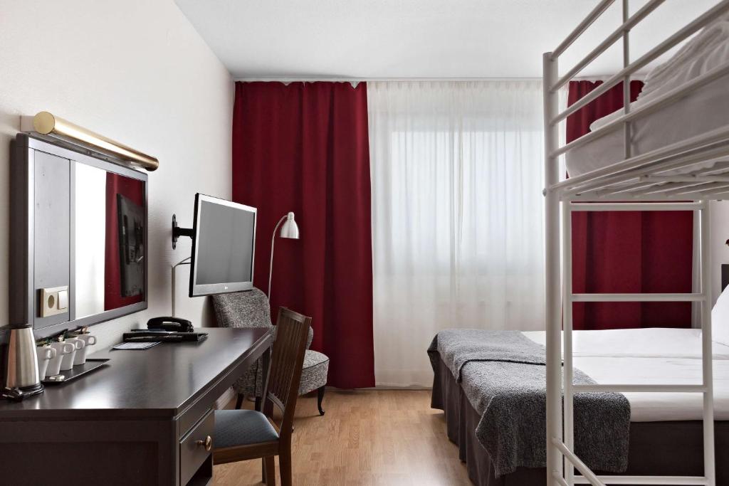 Postel nebo postele na pokoji v ubytování Best Western Gustaf Froding Hotel & Konferens
