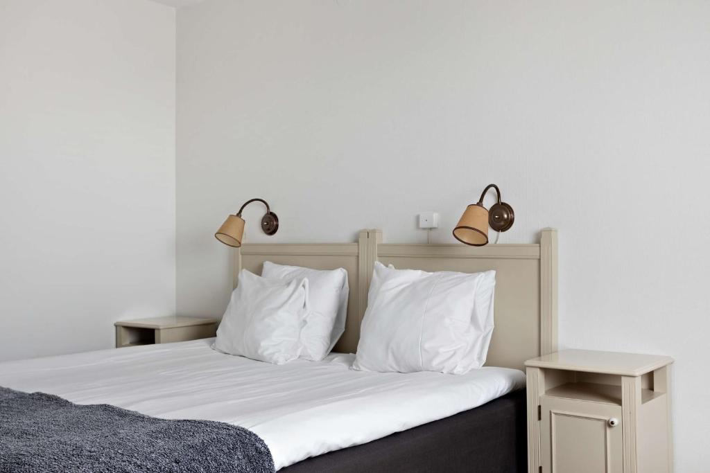 Postel nebo postele na pokoji v ubytování Best Western Gustaf Froding Hotel & Konferens