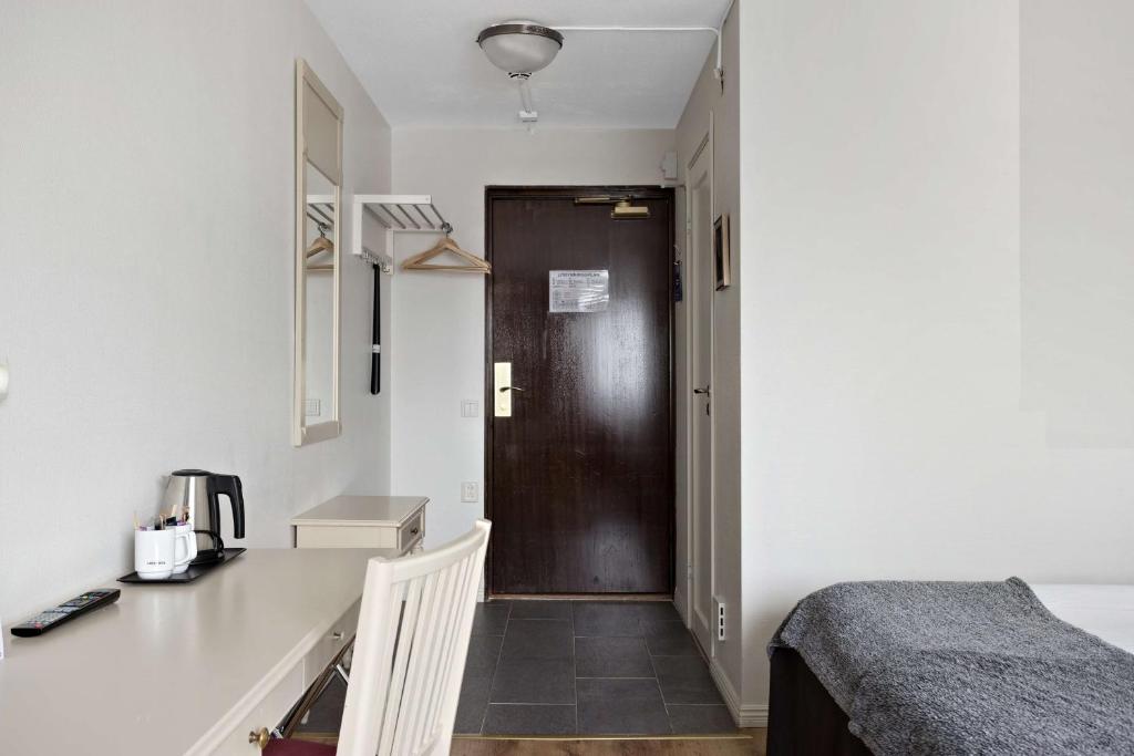 Postel nebo postele na pokoji v ubytování Best Western Gustaf Froding Hotel & Konferens