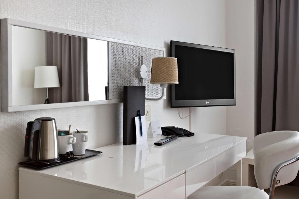 TV a/nebo společenská místnost v ubytování Best Western Gustaf Froding Hotel & Konferens