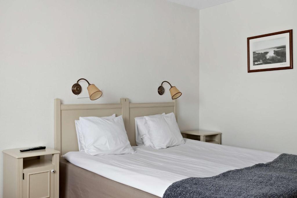 Postel nebo postele na pokoji v ubytování Best Western Gustaf Froding Hotel & Konferens
