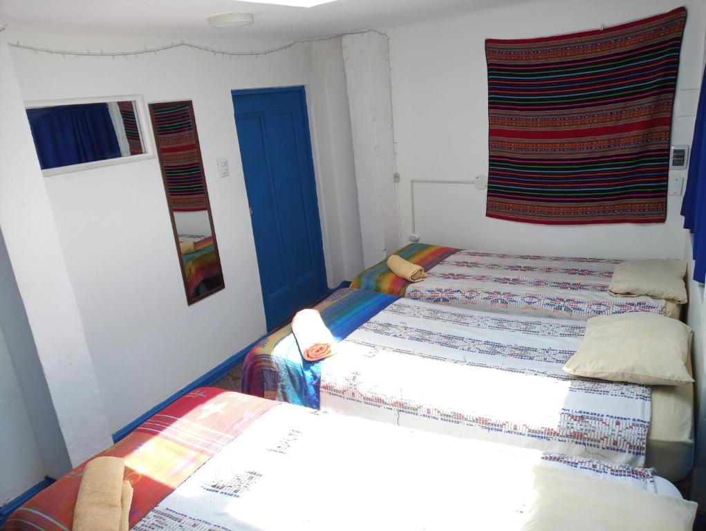Voodi või voodid majutusasutuse Posada Azul Cusco toas