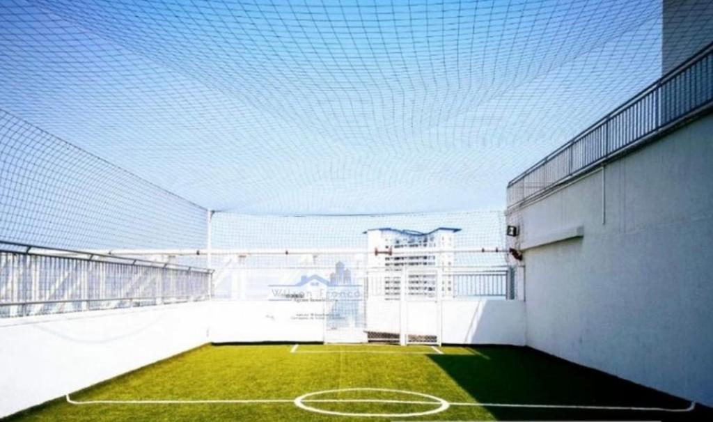 a balcony with a tennis court on the side of a building at Exclusive House Cartagena in Cartagena de Indias