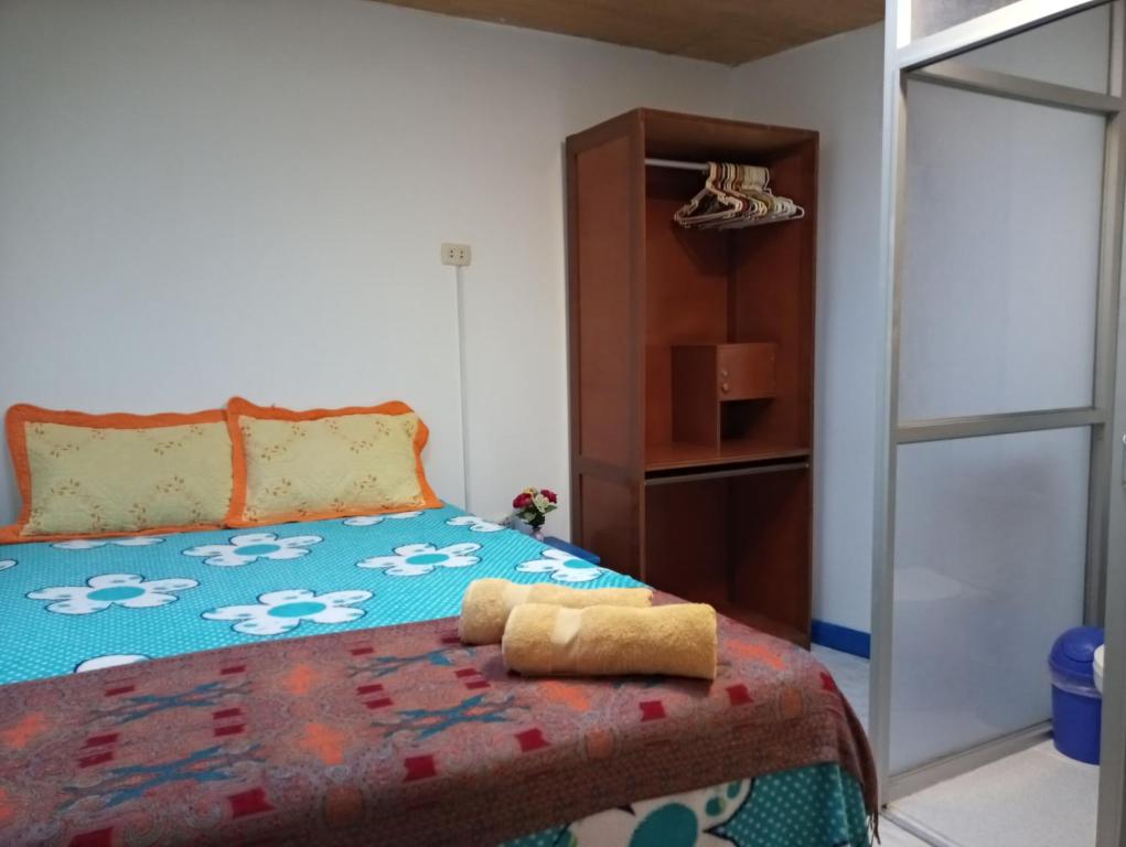 Voodi või voodid majutusasutuse Posada Azul Cusco toas