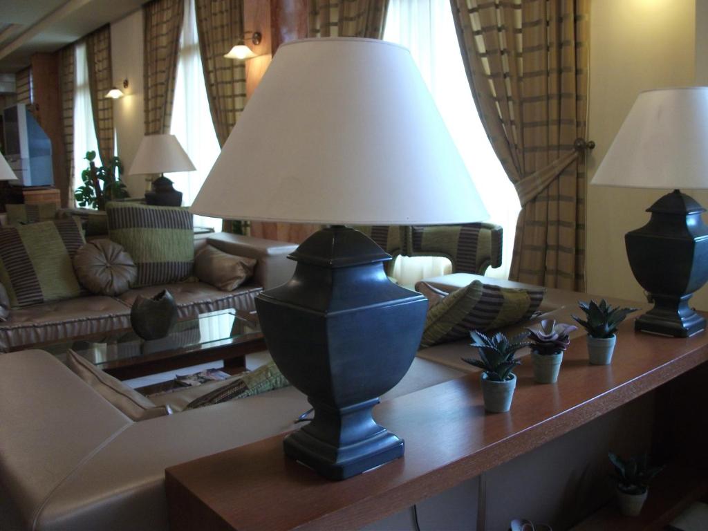 Posezení v ubytování Rex Hotel