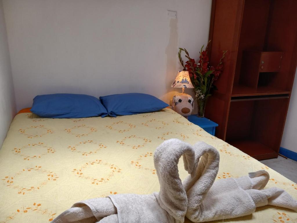 Voodi või voodid majutusasutuse Posada Azul Cusco toas
