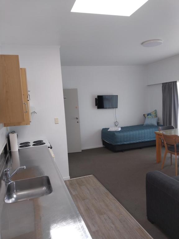 Postel nebo postele na pokoji v ubytování Bayview Motel