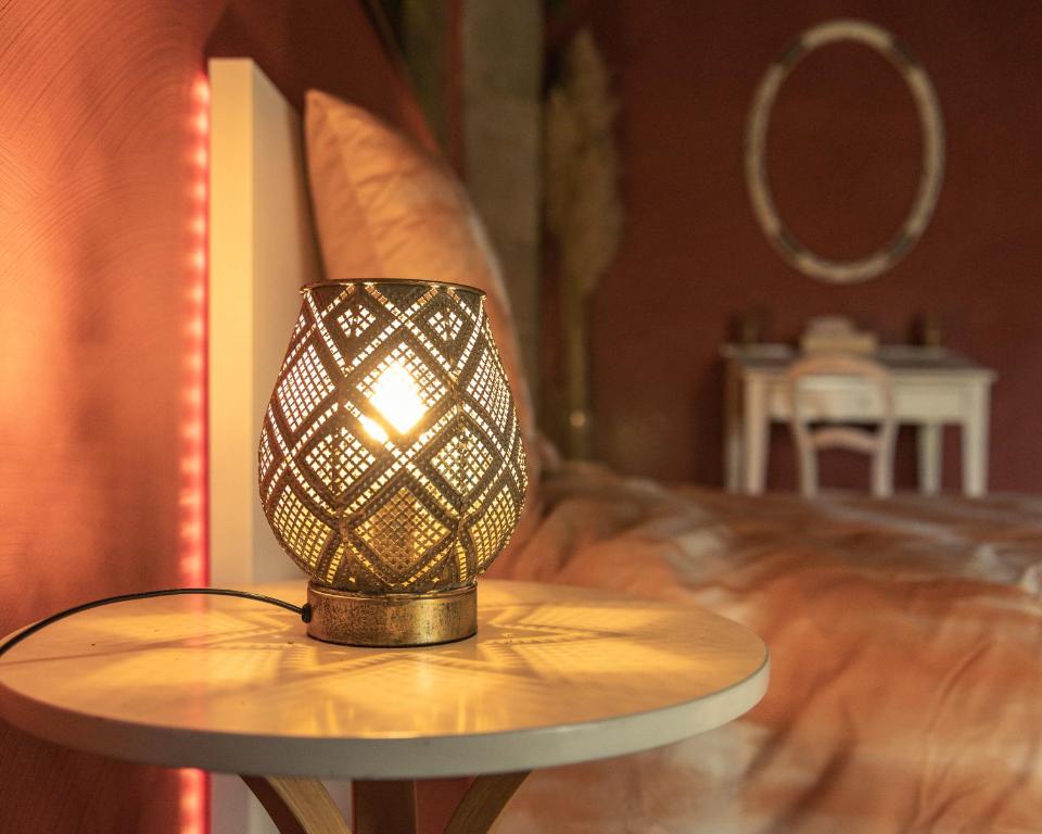 Postel nebo postele na pokoji v ubytování Le Temple d'Opaline