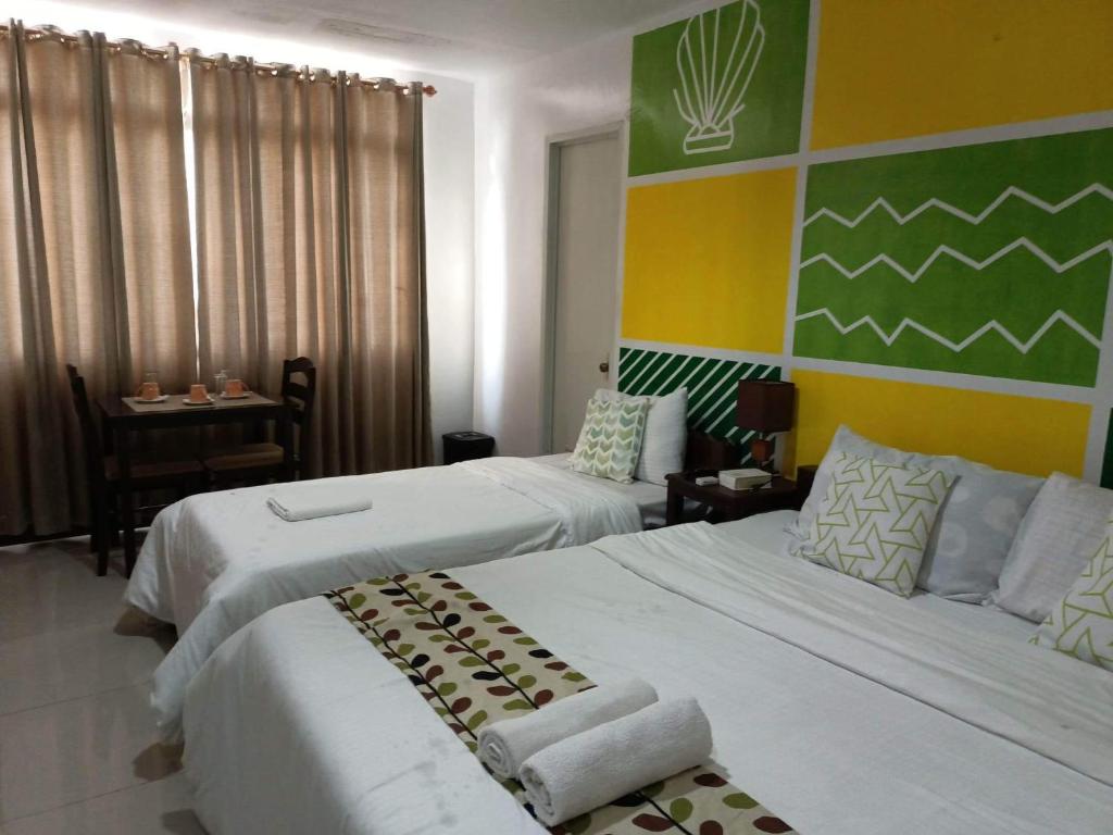 Postel nebo postele na pokoji v ubytování BOPEMPC Safari Hostel