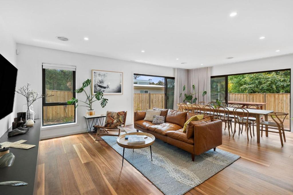 a living room with a couch and a table at McMillan Escape in Anglesea