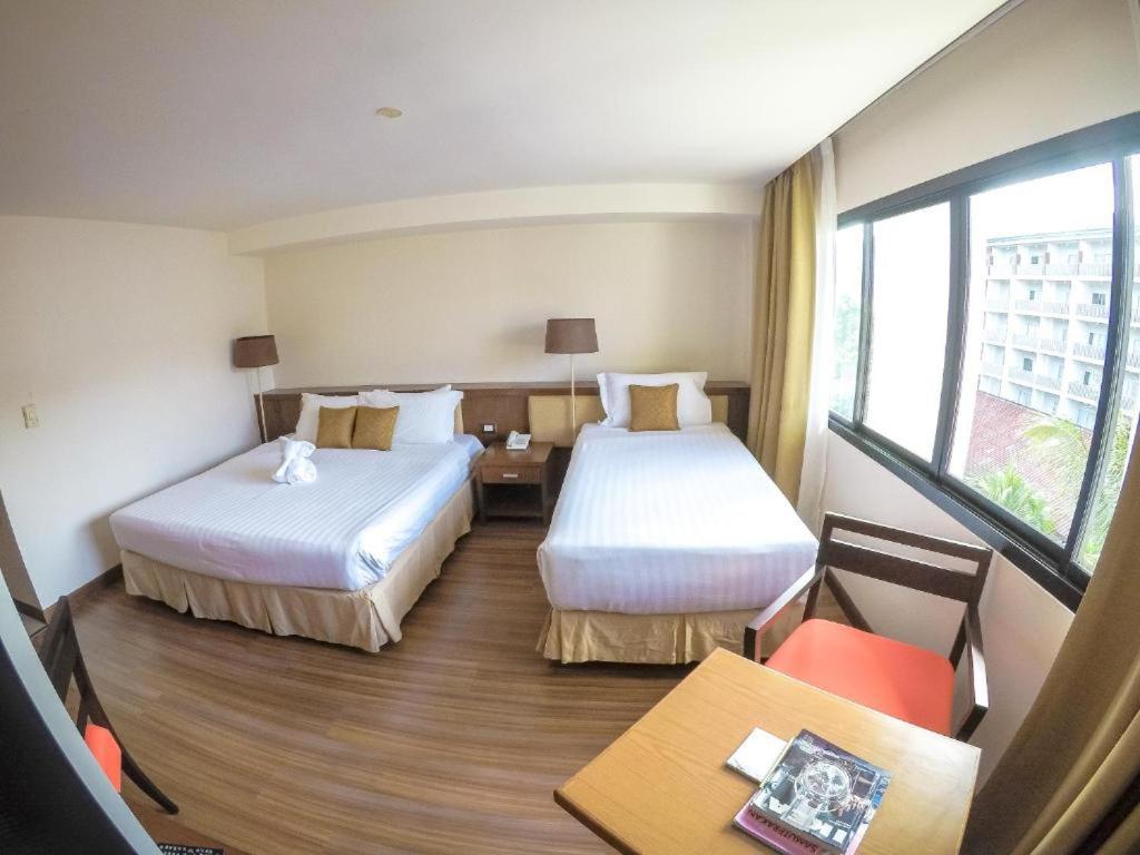Postel nebo postele na pokoji v ubytování Hiran Residence