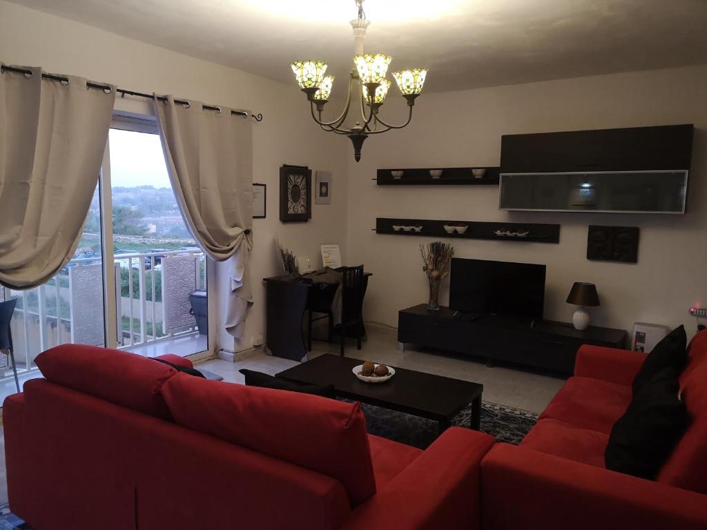 Posezení v ubytování Village Corner 3 bedroom apartment with Garage