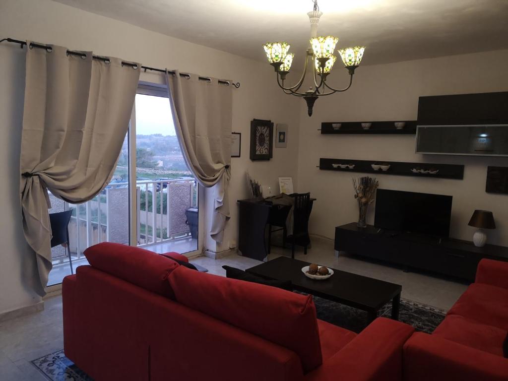 Posezení v ubytování Village Corner 3 bedroom apartment with Garage