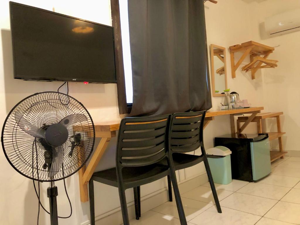 TV a/nebo společenská místnost v ubytování La Sirenita