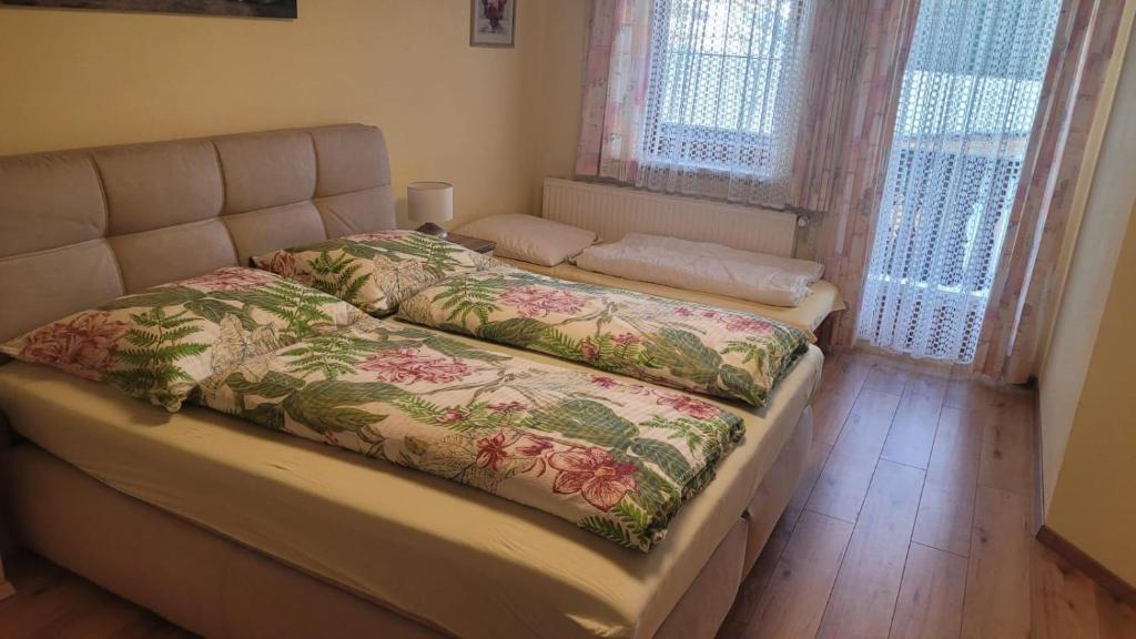 Postel nebo postele na pokoji v ubytování Gästehaus Raab
