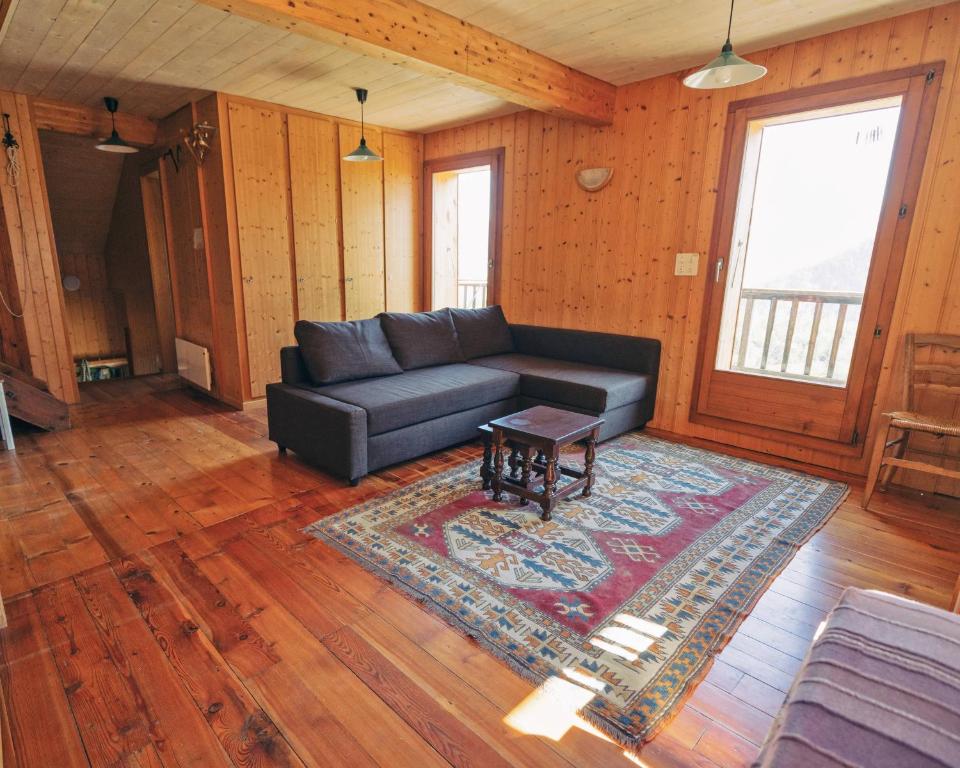 Posezení v ubytování Chalet les Mésanges - Salvan