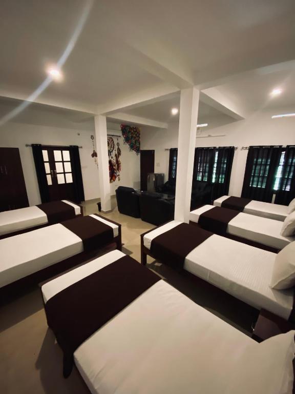 Postel nebo postele na pokoji v ubytování 3 Hills Hostel