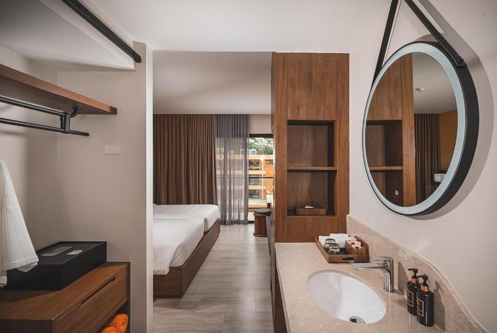 Ein Bett oder Betten in einem Zimmer der Unterkunft Pamookkoo