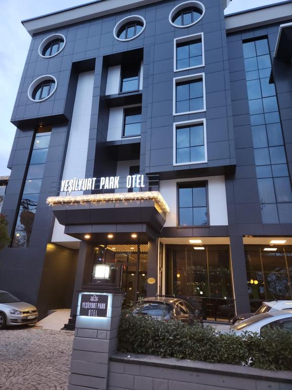 a building with a sign that reads the harbor park office at Yeşilyurt Park Otel in Çorlu