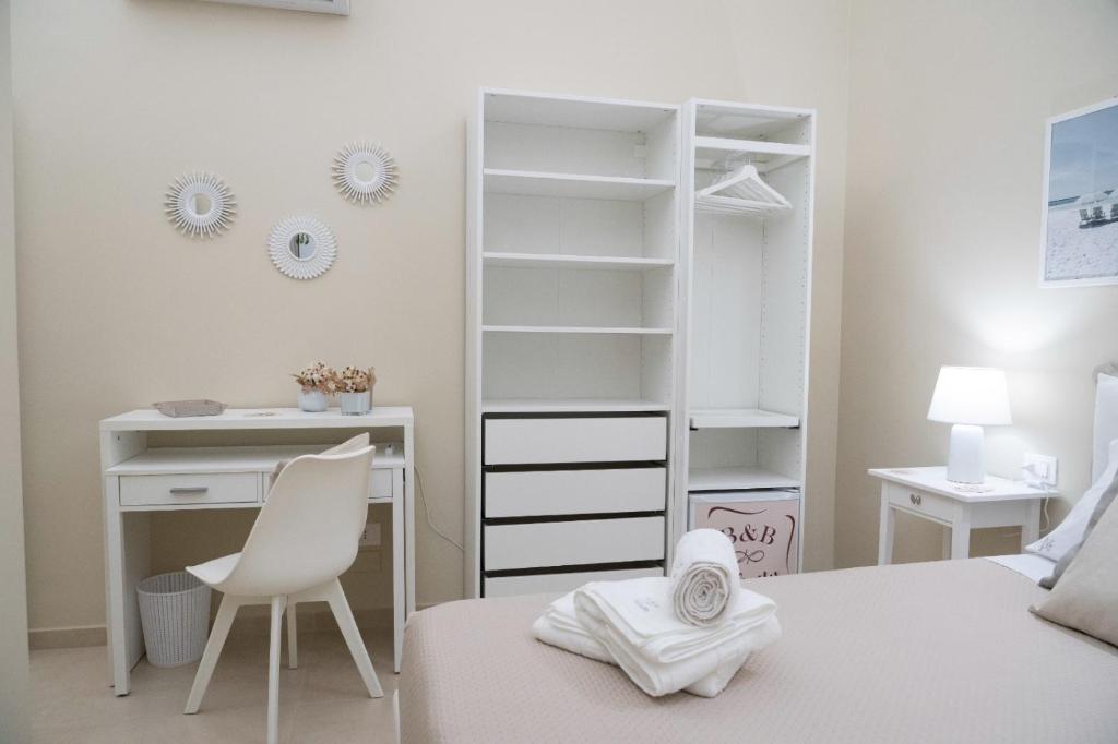 Postel nebo postele na pokoji v ubytování B & B INFINITY