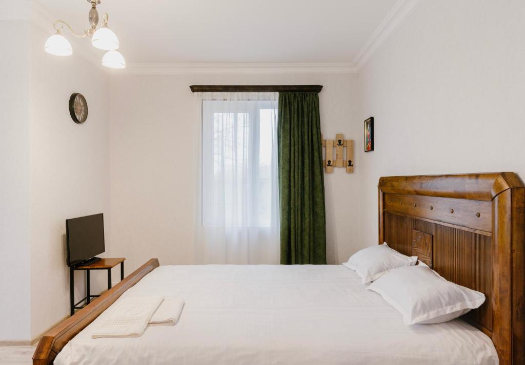 Postel nebo postele na pokoji v ubytování Marcos Hotel