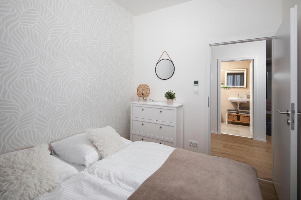 A bed or beds in a room at Apartmán Holia, Kubínska Hoľa