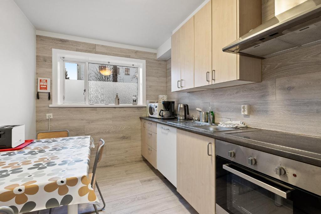 Kuchyň nebo kuchyňský kout v ubytování Acco Guesthouse