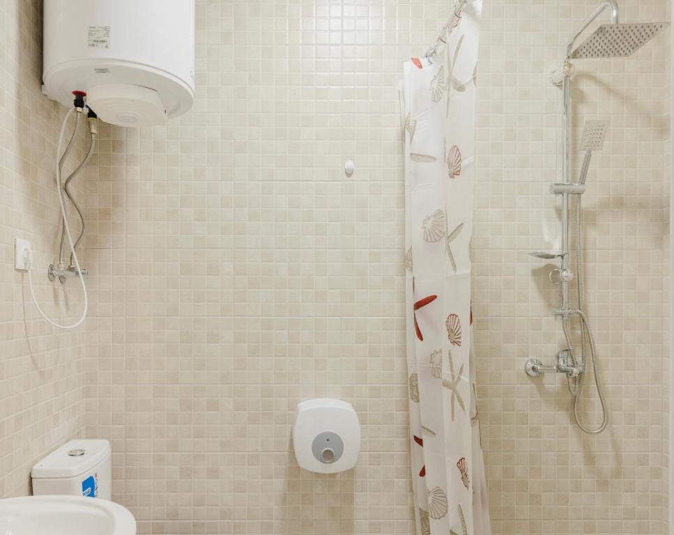 Koupelna v ubytování Marcos Hotel