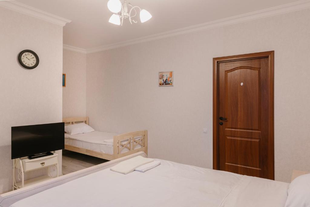 Postel nebo postele na pokoji v ubytování Marcos Hotel
