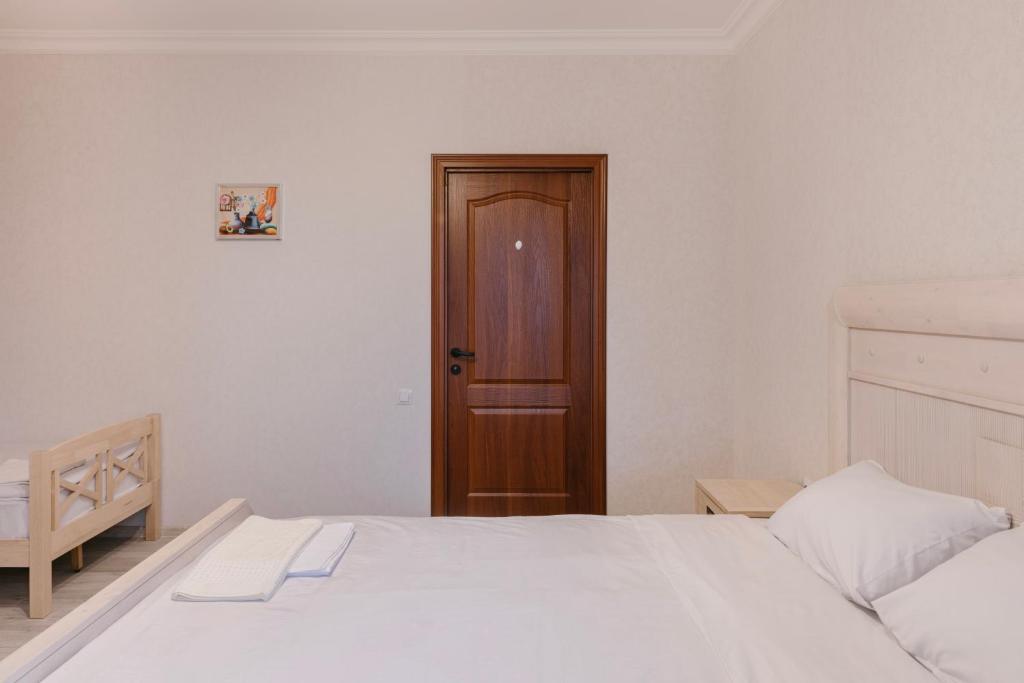 Postel nebo postele na pokoji v ubytování Marcos Hotel