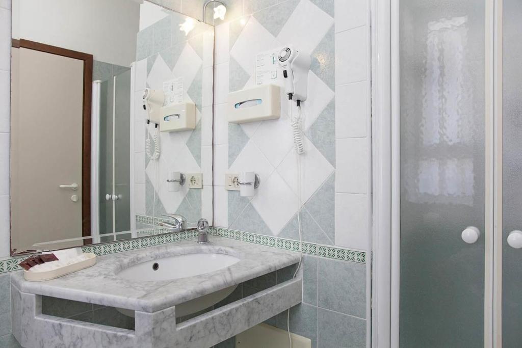 Koupelna v ubytování Hotel Elpiro
