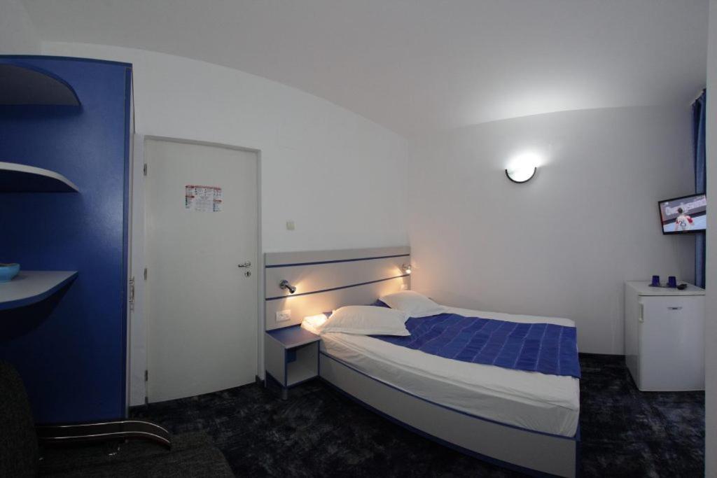 Postel nebo postele na pokoji v ubytování Vila Wolf