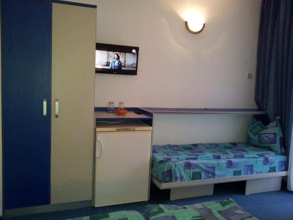 Postel nebo postele na pokoji v ubytování Vila Wolf