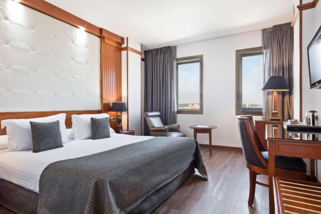 Postel nebo postele na pokoji v ubytování Best Western Premier CMC Girona