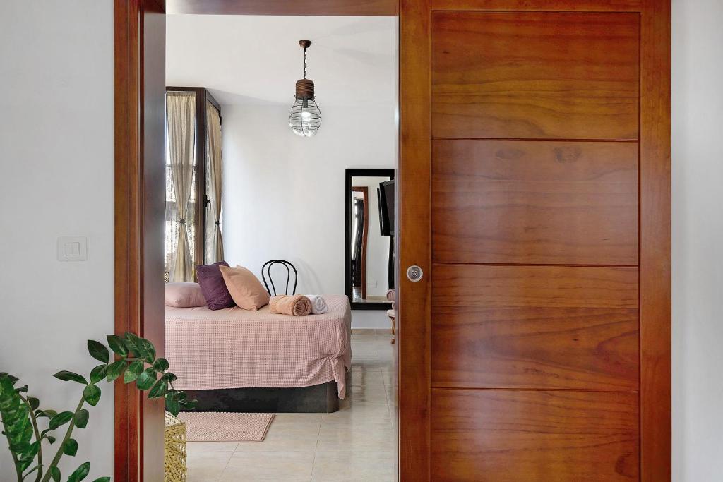A bed or beds in a room at Guenia I