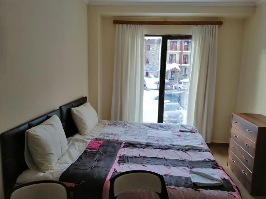 Postel nebo postele na pokoji v ubytování Sano House